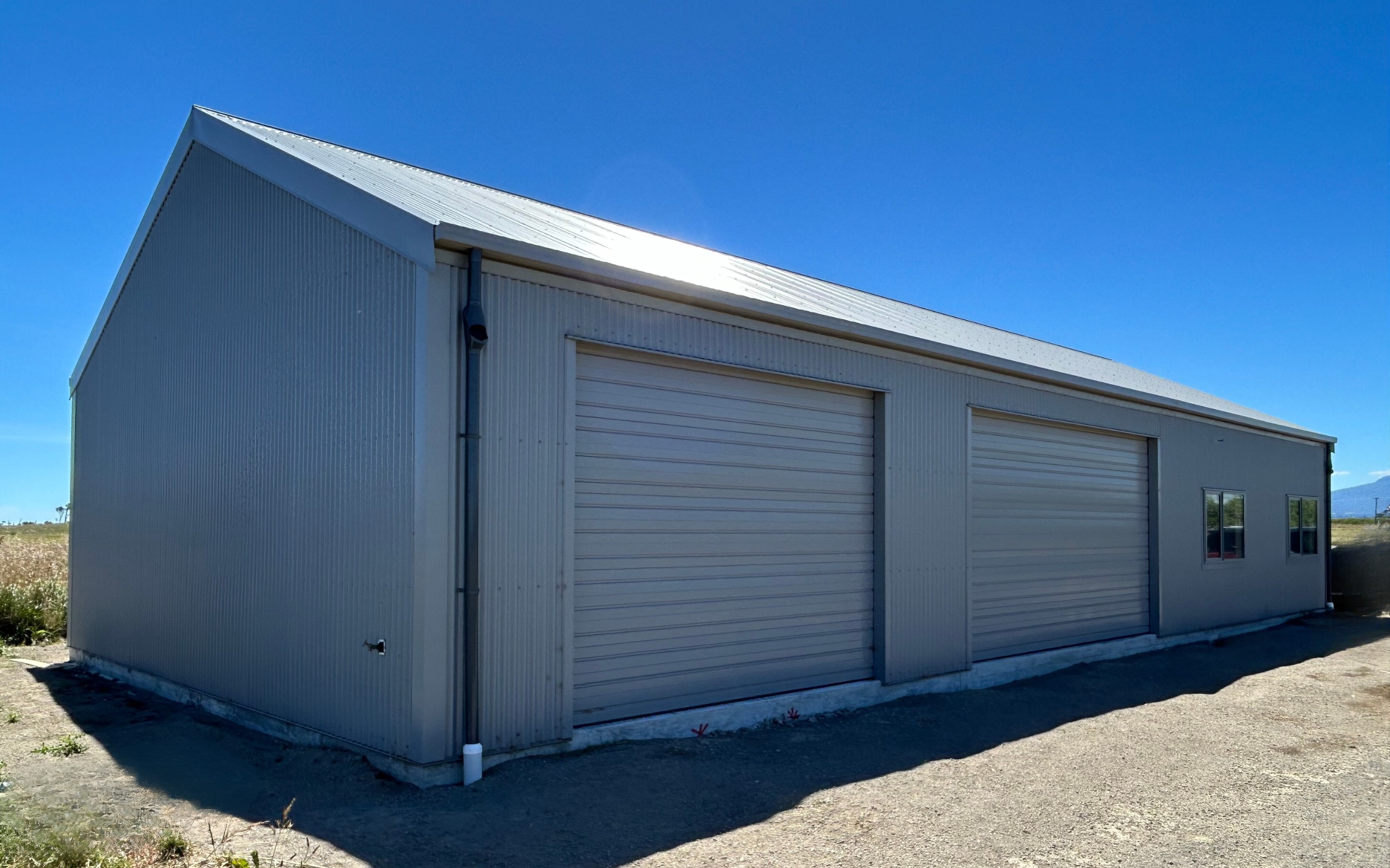 11m x 8.5m garage with an additional 57m2 of flexible space for storage