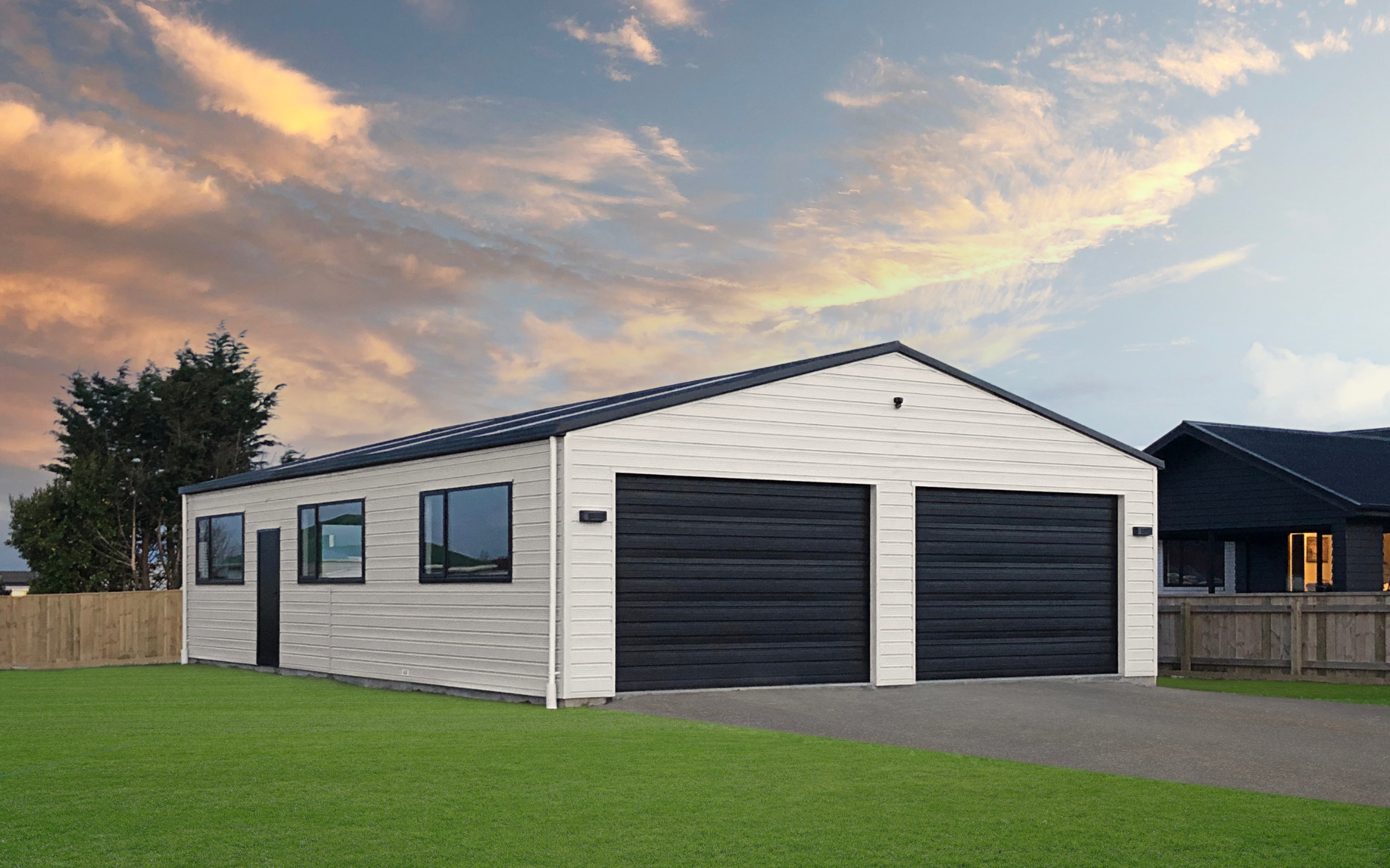 13.2m x 9m x 2.7m stud custom garage Superclad li Windows. Desert Sand with Tempest roof gutter and trim